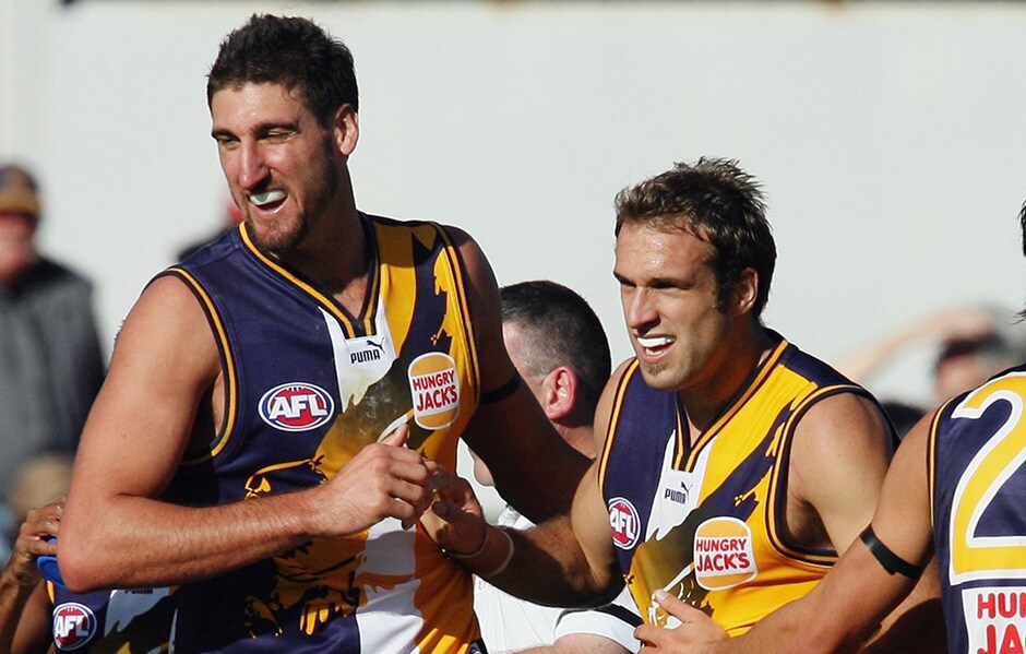 AFL 2006 Rd 4 - Kangaroos v West Coast Eagles Chris Judd (C) of the Eagles celebrates with Dean Cox after scoring a goal during the round four AFL match between the Kangaroos and West Coast Eagles at Manuka Oval on April 23, 2006 in Canberra, Australia.